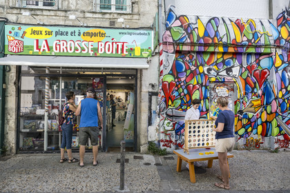 France, Charente Maritime, La Rochelle, games store and street art on rue Saint Nicolas in the old fishermen's district