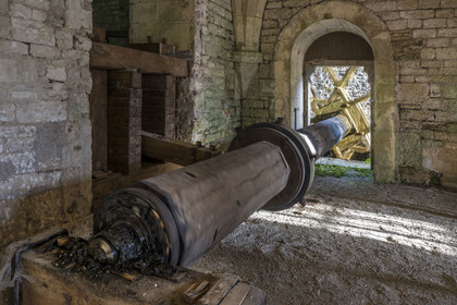 France, Cote d'Or, Marmagne, the Cistercian Abbey of Fontenay listed as World Heritage by UNESCO, the 12th century hydraulic forge, reconstruction of a martinet, a large rocking hammer once powered by hydraulic energy to forge iron