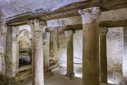 France, Yonne, Auxerre, Saint Germain Abbey church, confession in the crypt, reused Gallo-Roman marble columns surrounding the sarcophagus of Germain in what remains of the 5th century oratory