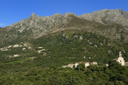 France, Haute Corse, Balagne, Feliceto church and perched village of Nessa in the background