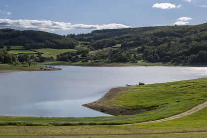France, Nievre, Regional Natural Park of Morvan, Chaumard, Pannecière lake, angler by the lake