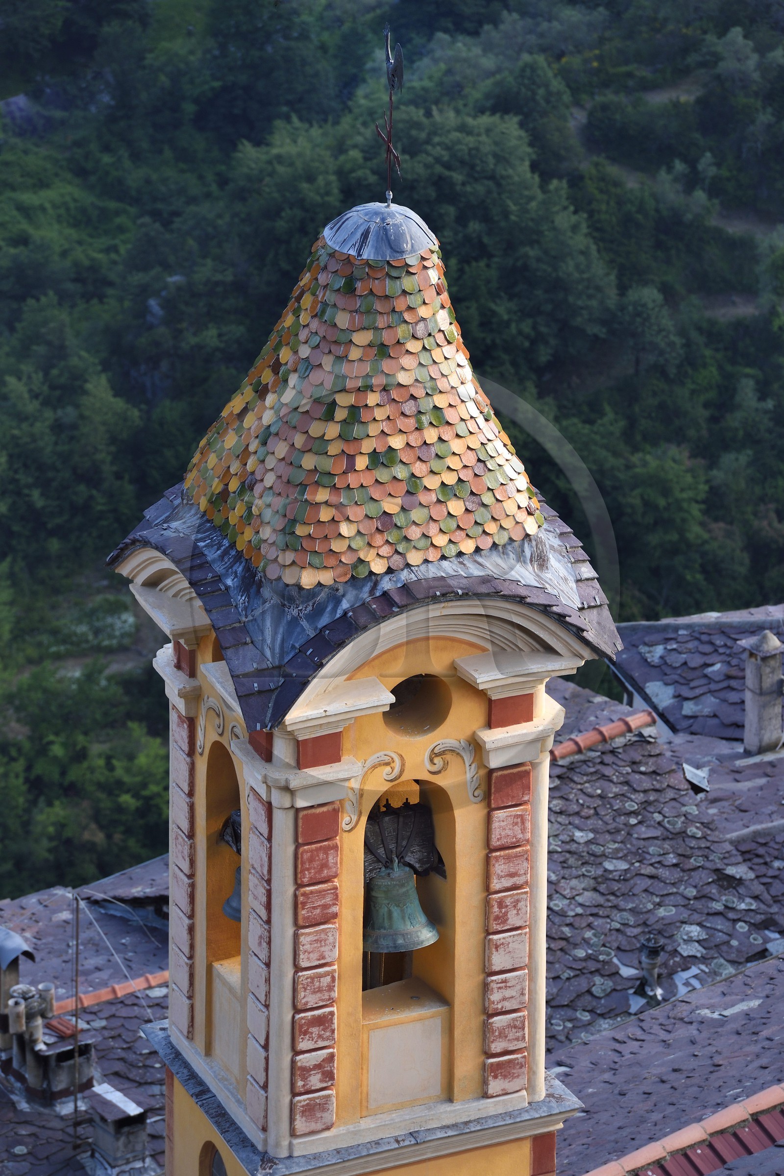 France, Alpes-Maritimes, Roya Valley (Nice hinterland), at the foot of the Mercantour National Park, Saorge, glazed tiles bell tower of the chapel Saint Jacques of the White Penitents