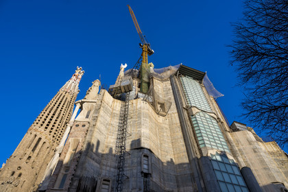 Spain, Catalonia, Barcelona, Eixample district, Sagrada Familia basilica by Catalan modernist architect Antoni Gaudi, listed as a UNESCO World Heritage Site, the Glory facade under construction