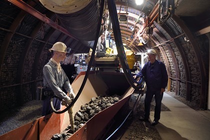 France, Moselle, Petite Rosselle, carreau Wendel museum, bottom of the mine reconstruction, coal digging gallery, roadheading machine (Alpine Miner 100) that cuts the coal, evacuates it, puts in the tunnel supports, removes dust and serves as a working floor surface