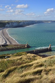 France, Seine Maritime, Pays de Caux, Cote d'Albatre, Fecamp, Pointe Fagnet lighthouse at the entrance of the harbor and the beach of Fecamp in the background
