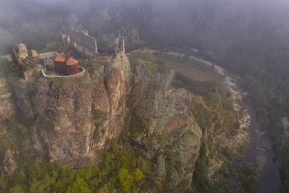 France, Haute Loire, Loire river Valley, Arlempdes, labelized the Most Beautiful Villages of France, ruins of the castle perched on a basalt rock (volcanic dyke) overlooking a Loire river meander (aerial view)