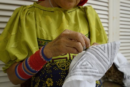 Panama, Panama City, workshop of the French fashion designer Helene Breebaart, traditional embroidery work of a Mola by an indigenous peoples of the Americas Kuna (Cuna) woman