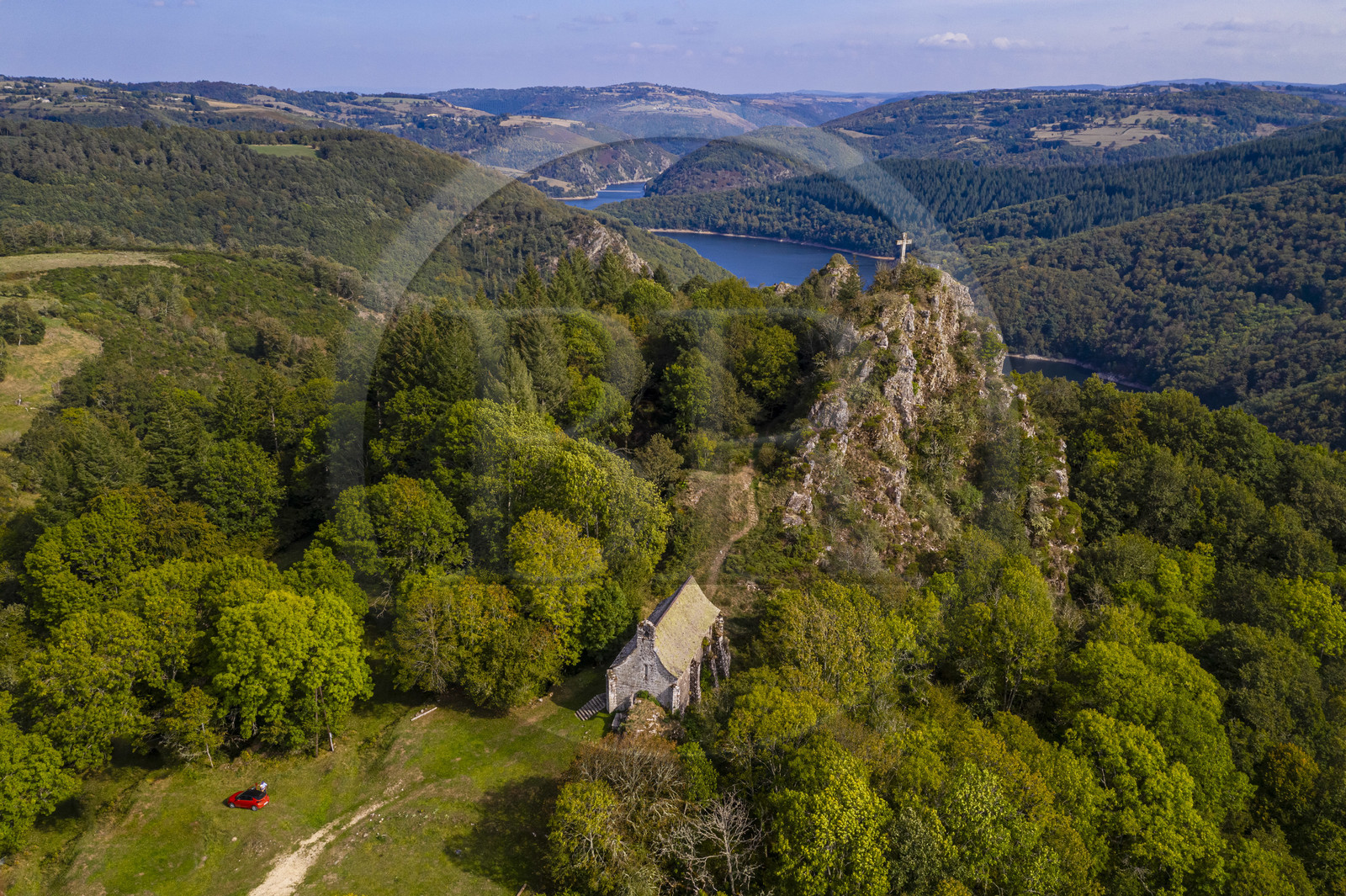 France, Cantal, Paulhenc, the Gorges de la Truyere (Truyere river canyon), the Rocher de Turlande, Romanesque castral chapel of the castle destroyed during the Hundred Years War in which was born Robert de Turlande, founder of the Abbey of La Chaise Dieu (aerial view)