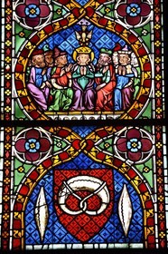 Germany, Baden-Wurttemberg, Freiburg im Breisgau, the cathedral (Munster), the 14th century stained glasses are gifts of guilds and include symbols representing them, here the bakers' guild represented by a pretzel