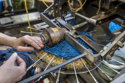 France, Drome, Drome provencale, Nyons, La Scourtinerie, the last scourtin factory in Provence, traditional filters used in the production of olive oil but also designed today as decorative objects made of coconut fiber, manufacturing of scourtins in their workshop on custom-made circular looms