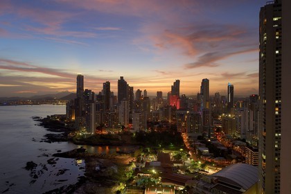 Panama, Panama City, waterfront skyscrapers of Punta Paitillia district after sunset