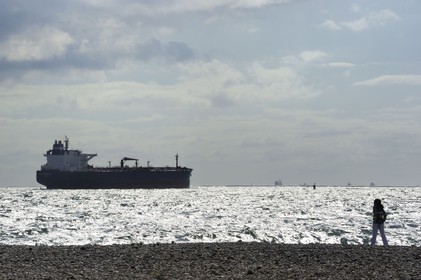 France, Seine Maritime, Le Havre, cargo leaving the port seen from the city beach