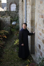 France, Manche, the abbey of Mont Saint Michel, listed as World Heritage by UNESCO, brother Sebastien, monk of Monastic Fraternities of Jerusalem