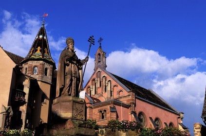 France, Haut Rhin, Eguisheim village, labelled Les Plus Beaux Villages de France (The Most Beautiful Villages of France), statue of the Pope Leon XI and the chapel on the main square