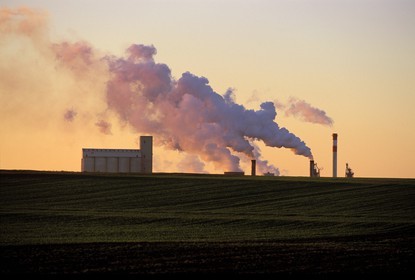 France, Ardennes, factory smokes in the countryside