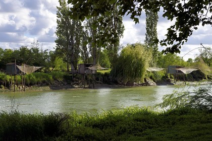 France, Charente-Maritime, Saintonge, Saint Savinien, labeled stones and water villages, fishing huts with a net along the Charente river