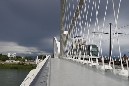France, Bas Rhin, Strasbourg, the pedestrian, bicycle and the tram line D bridge over the Rhine river connecting Strasbourg to Kehl in Germany inaugurated on 28 April 2017 called Beatus Rhenanus bridge