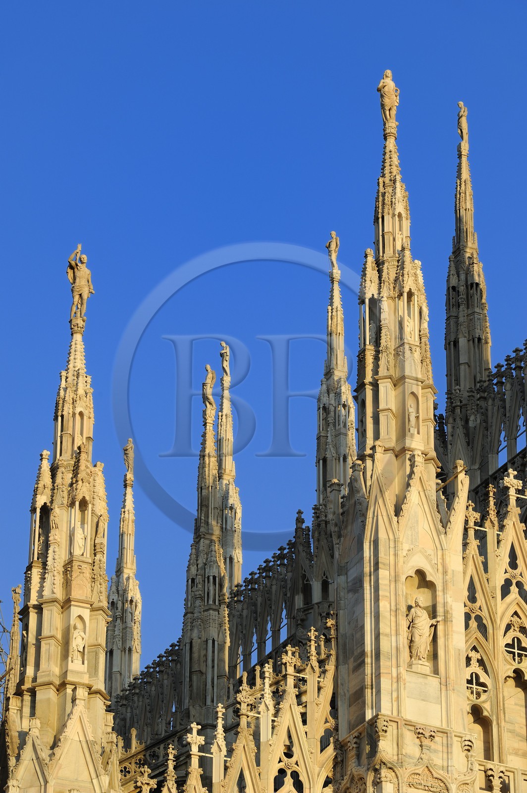 Italy, Lombardy, Milan, the Duomo in the historical center, cathedral in Gothic Flamboyant style, spires topped by statues