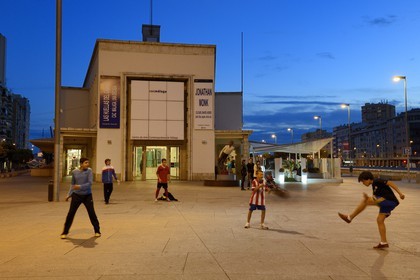 Spain, Andalusia, Malaga, Soho district, Contemporary Art Centre (CAC Malaga), children playing football