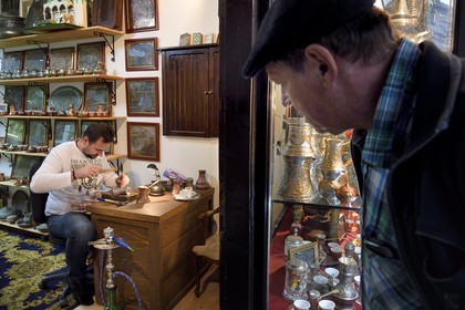 Bosnia and Herzegovina, Sarajevo, Bascarsija district in the old town, Bascauseyic artisan manufacturer of copper objects in Kazandziluk street