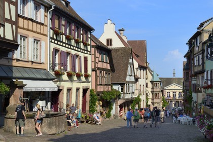 France, Haut Rhin, Riquewihr, labelled Les Plus Beaux Villages de France (The Most Beautiful Villages of France), traditional half-timbered houses in the main street (rue du Général de Gaulle) and the Town Hall in the background