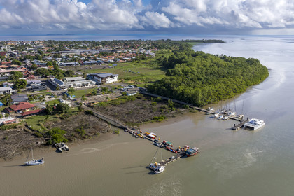 France, French Guiana, Kourou, the fishermen's jetty on the Kourou River and the Balourous maritime station (aerial view)