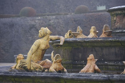 France, Yvelines, parc du Chateau de Versailles, listed as World Heritage by UNESCO, the Latona Basin in the winter fog