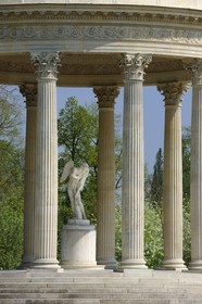 France, Yvelines, Chateau de Versailles, listed as World Heritage by UNESCO, Domaine de Marie Antoinette, the Petit Trianon Garden, the Love Temple, statue by Bouchardon called Cupid Cutting His Bow from the Club of Hercules