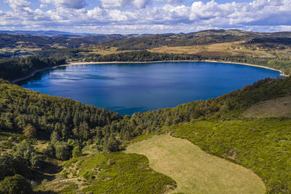 France, Ardeche, parc naturel regional des Monts d'Ardeche (Regional natural reserve of the Mounts of Ardeche), Mezenc Massif, Lac d'Issarles, a Maar-type volcanic lake seen from the Col du Gage (aerial view)