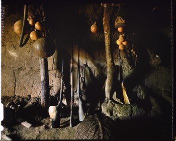 Burkina Faso, Poni province, Lobi land, Loropéni region, Lacar, house entrance with powder guns, each family Lobi has a small arsenal always ready to serve to face a possible attack of the house or the village