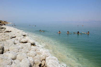 Israel, Southern District, swimmers at Ein Gedi Beach on the Dead Sea, saline concretions