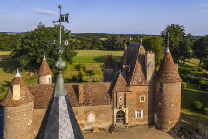 France, Allier (03), former province of Bourbonnais, Chapeau, Chateau de la Cour (15th century to late 16th century), with a decor of black brick herringbone on a background of red bricks, weathercock (aerial view)