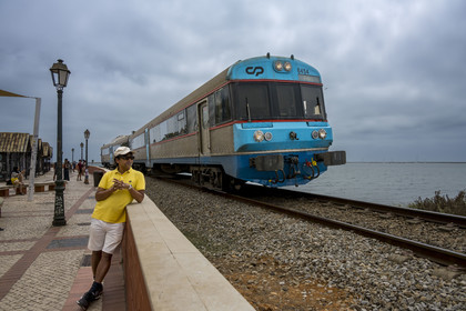 Portugal, Algarve, Faro, the old town, the Algarve railway line (Linha do Algarve) which connects the city of Lagos to that of Vila Real de Santo Antonio on the edge of the Ria Formosa Natural Park