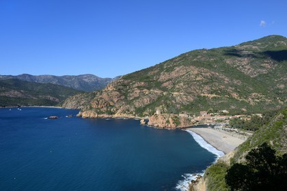 France, Corse du Sud, Golfe de Porto, listed as World Heritage by UNESCO, the Genoese tower above the port pass of Porto and its beach