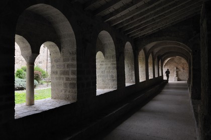 France, Herault, Medieval town of Saint-Guilhem-le-Desert, a stop on el Camino de Santiago, pilgrimage route to Compostela, labelled Les Plus Beaux Villages de France (The Most Beautiful Villages of France), abbey of Gellone from the 11th century listed as World Heritage by UNESCO, the cloister