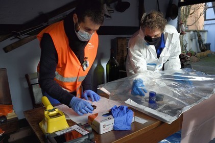 France, Bas-Rhin, Schiltigheim, intervention of two engineers from the National Agency for the Management of Radioactive Waste (Andra) in a private home to remove radioactivity from a rare model of a century-old radium fountain