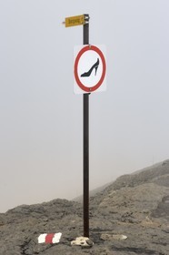 Switzerland, Canton of Bern, Bernese Oberland, Murren, it is forbidden to wear high heels on the Bergweg (mountain path)