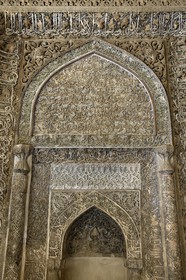 Iran, Isfahan Province, Isfahan, Jame Mosque, shabestan, Uljaitu Sultan hall, the stucco mihrab where Koranic inscriptions are mixed with floral motives