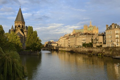 France, Moselle, Metz, Ile du Petit Saulcy, the Temple Neuf also called Eglise des allemands (the New Temple or Church of the Germans) reformed Prostestant Shrine and the canalized River Moselle banks with the Saint Etienne cathedral in the background right