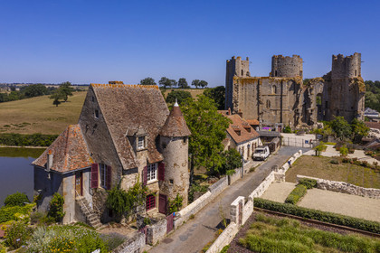 France, Allier (03), former province of Bourbonnais, the 13th century Bourbon l'Archambault castle and a 16th century canons' house at the entrance of the medieval fortress(aerial view)