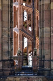 France, Bas Rhin, Strasbourg, old town listed as World Heritage by UNESCO, Notre Dame Cathedral, halfway up each of the four spiral staircases called the Vier Schnecken (four snails), a footbridge connects them to the octagonal tower and there are two statues, here Sainte Catherine and Sainte Barbe