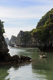 Vietnam, Quang Ninh Province, Halong Bay, listed as World Heritage by UNESCO, fishing boat