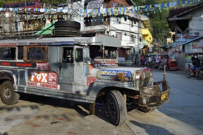 Philippines, Ifugao province, Banaue town, jeepney (elongated jeep to transport passengers) on the main square