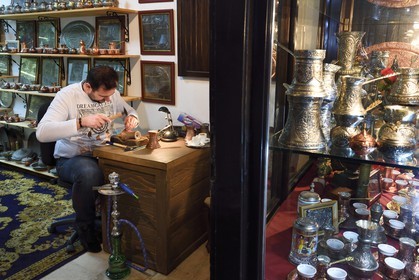 Bosnia and Herzegovina, Sarajevo, Bascarsija district in the old town, Bascauseyic artisan manufacturer of copper objects in Kazandziluk street