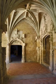 France, Dordogne,  Perigord Noir, Le Buisson de Cadouin, former cistercian abbey church, stage on the Camino de Santiago (Way of St. James) listed as World Heritage by UNESCO, the cloister of the 15th century, Renaissance door