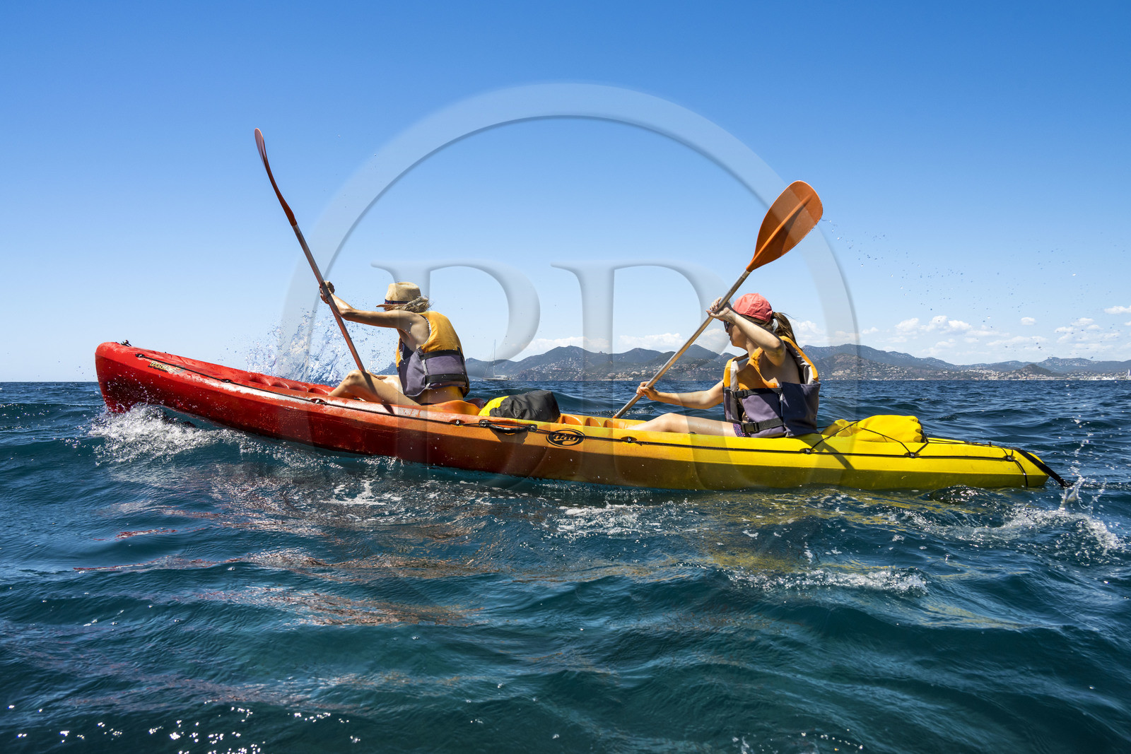 France, Alpes-Maritimes, Cannes, kayaking in the Lerins Islands, passage between Cap de la Croisette and Ile Sainte-Marguerite, the Esterel mountains in the background