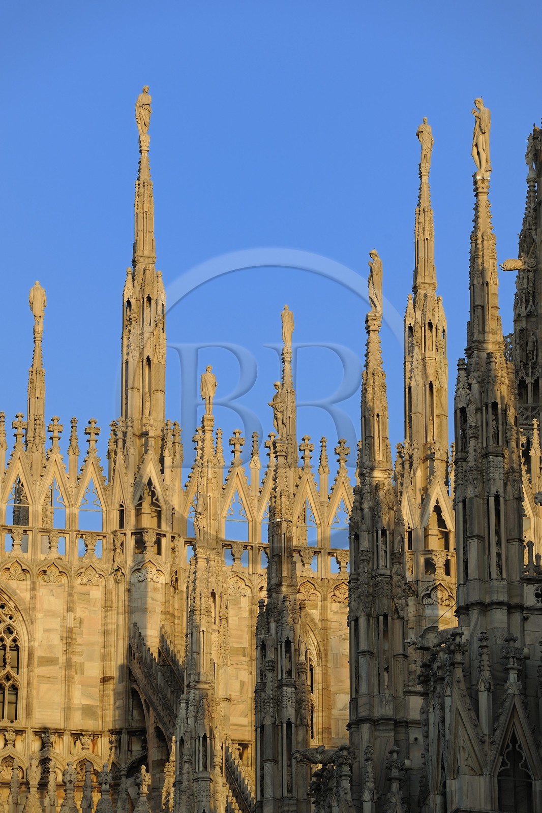 Italy, Lombardy, Milan, the Duomo in the historical center, cathedral in Gothic Flamboyant style, spires topped by statues