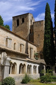 France, Herault, Medieval town of Saint-Guilhem-le-Desert, a stop on el Camino de Santiago, pilgrimage route to Compostela, labelled Les Plus Beaux Villages de France (The Most Beautiful Villages of France), abbey of Gellone from the 11th century listed as World Heritage by UNESCO, the cloister