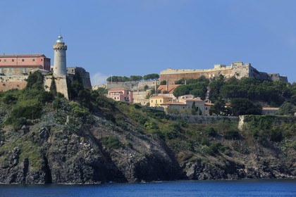 Italy, Tuscany, Elba Island, the Medici fortifications, the lighthouse Portoferraio and the house of Napoleon 1st in the Palazzina dei Mulini on the edge of the cliff