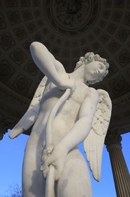 France, Yvelines, Chateau de Versailles, listed as World Heritage by UNESCO, Domaine de Marie Antoinette, the Petit Trianon Garden, the Love Temple, statue by Bouchardon called Cupid Cutting His Bow from the Club of Hercules